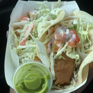 Fish tacos, salsa is spicy!