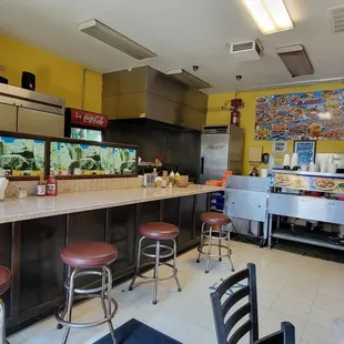 a kitchen with a fish tank