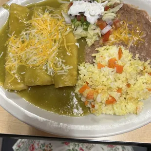3 cheese enchiladas with green sauce, rice and beans
