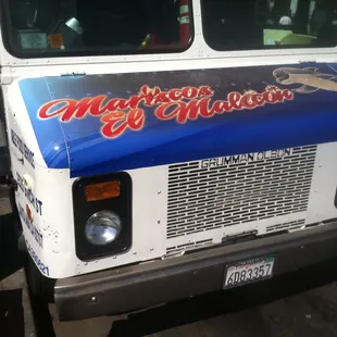 a blue and white truck
