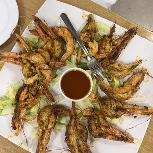 a plate of grilled shrimp