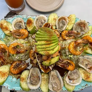 a platter of seafood and avocado