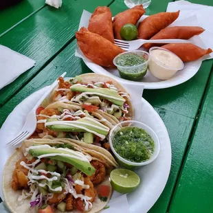 Shrimp tacos and empanadas.