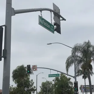 a traffic light and street signs