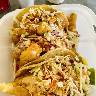 2 shrimp tacos and 1 fish taco