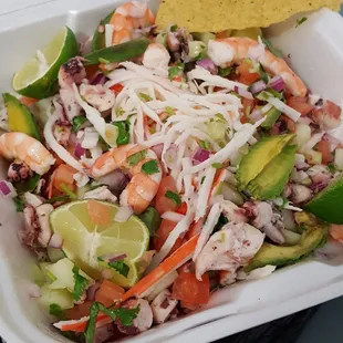 Super Mixta - fish, imitation crab, octopus, shrimp, cucumber, tomato, red onion, avocado and lime $9
