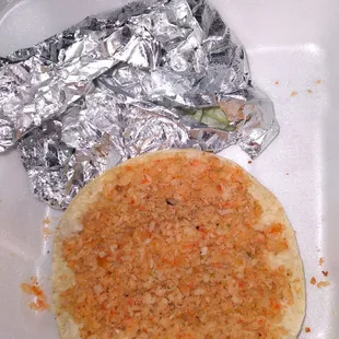 Ordered to dine in, they gave it to me to go instead. Never seen marlin tacos like this.