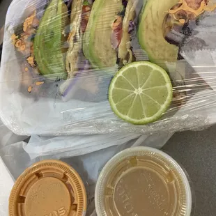 Well packaged three fish tacos for $10 to go