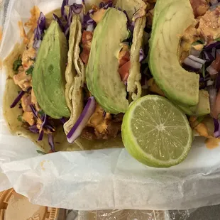 Clearer picture of three battered fish tacos for $10 with a juicy line and  salsas
