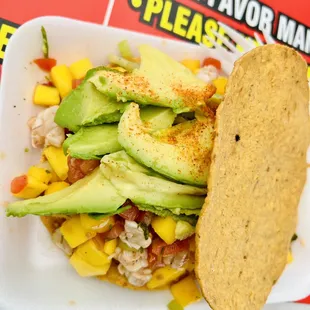 Fresh shrimp tostada with mango and extra avocado of course