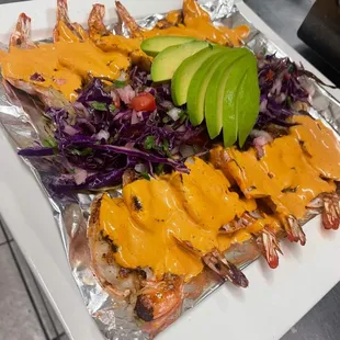 Camarones sarandiados (shrimp on a mild sauce with red onions and avocado)