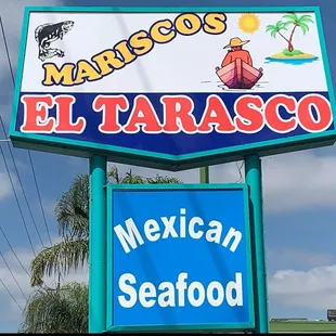 a sign for a mexican seafood restaurant