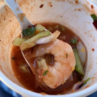 a bowl of soup with a spoon in it