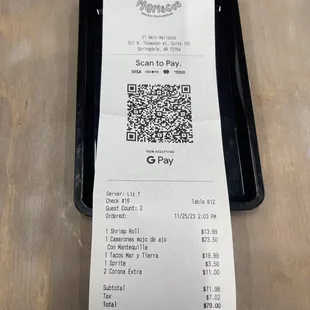 a receipt on a tray