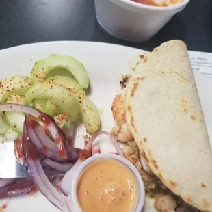 The gorbernator taco was bland and at orange sauce was idk what it was.