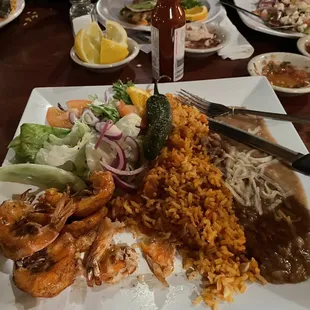 Shrimp al mojo del ajo (garlic shrimp) with rice and beans