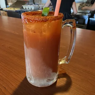 a bloody drink with a straw