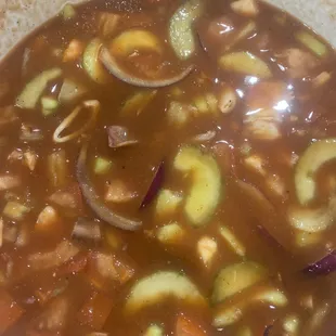 Shrimp,octopus,scallop,cucumber, onion,squid sauce think...it&apos;s La Seca