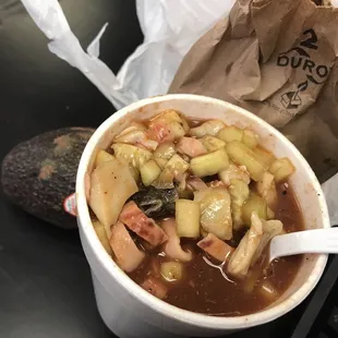 Tostada Especial in a Cup, came with my side Avocado  and chips