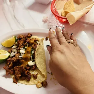 Hand for size comparison- tacos are huge and the tortillas are homemade