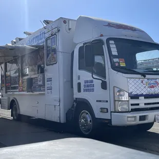 a food truck parked in a parking lot