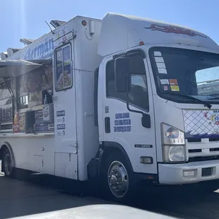 a food truck parked in a parking lot