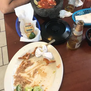 Our food is gone, homemade hot sauce is bomb in like great amazing and their HOMEMADE TORTILLAS GONE TOO!!!