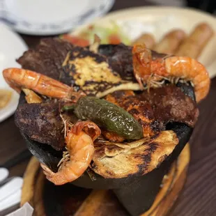 grilled meat and vegetables in a bowl