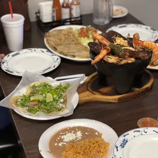 a table full of mexican food