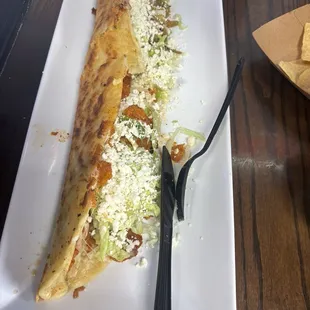 Got the machete half chicharon half flor de calabaza .