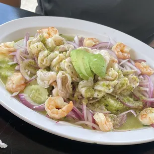 Verdes Aguachile- spicy but delicious, served on a big dinner plate with a plate of tostada for the whole table.