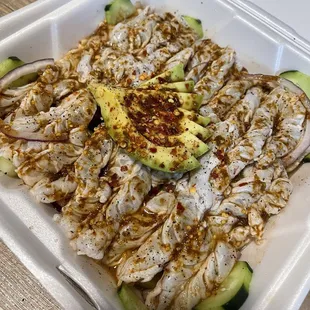 a meal in a styrofoam container