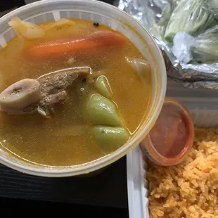 Caldo de res comes with rice &amp; tortillas
