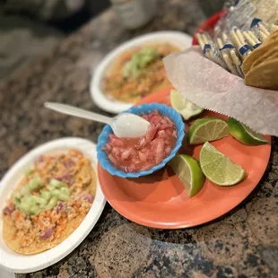 three plates of food on a counter