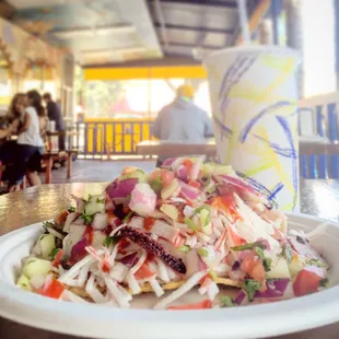 Big ol pile of imitation crab, octopus, and zesty veggies, stacked on a crispy tostada. Hot sauce and KETCHUP too ( I see you Yassi! )