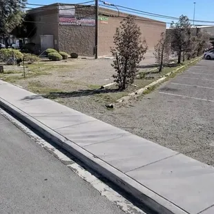 Parking next to restaurant. No signs say No Parking.