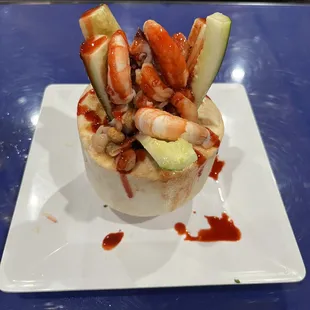 Coco Sayulita (Crab, shrimp, scallops, octopus, chopped clams, cucumber)  All beautifully presented inside a coconut. 19.99
