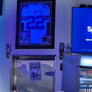 a bar with a large screen tv