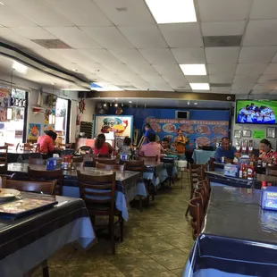 Inside restaurant. Back part is stage for band.