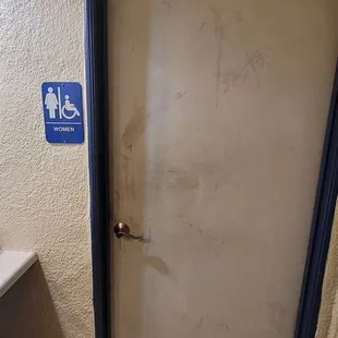 a bathroom with a toilet and sink