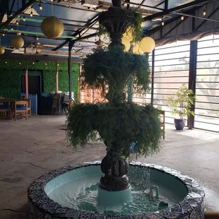 A working water fountain in the patio area