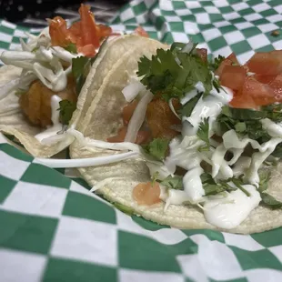 One shrimp and one fish taco... My daughter said they where so good she couldn't share