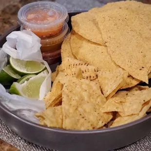 Sides from take-out with Molcajete and tacos order.