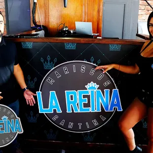 a man and a woman posing for a picture