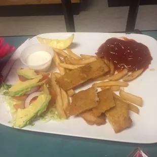 Kids plate. She ate half. Fried fish and fries. Both good.