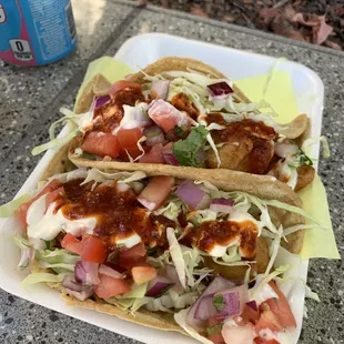 These were big fish tacos, I had eaten the first one and decided to take a photo before I ate them all