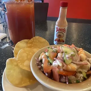Ceviche mixto and a Michelada