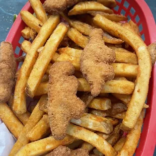Over cooked hard Costco frozen dinosaur nuggets for the kids meal.