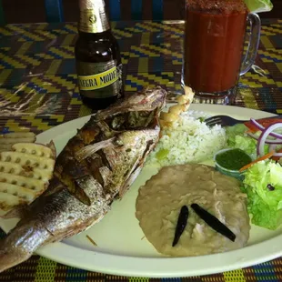 Fried red snapper. Huachninango frito
