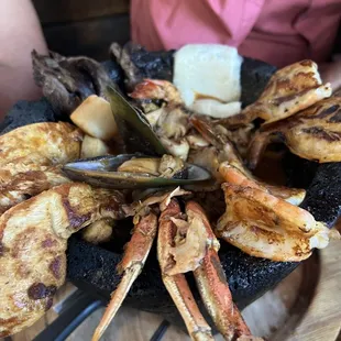 Mixed seafood and meats molcajete